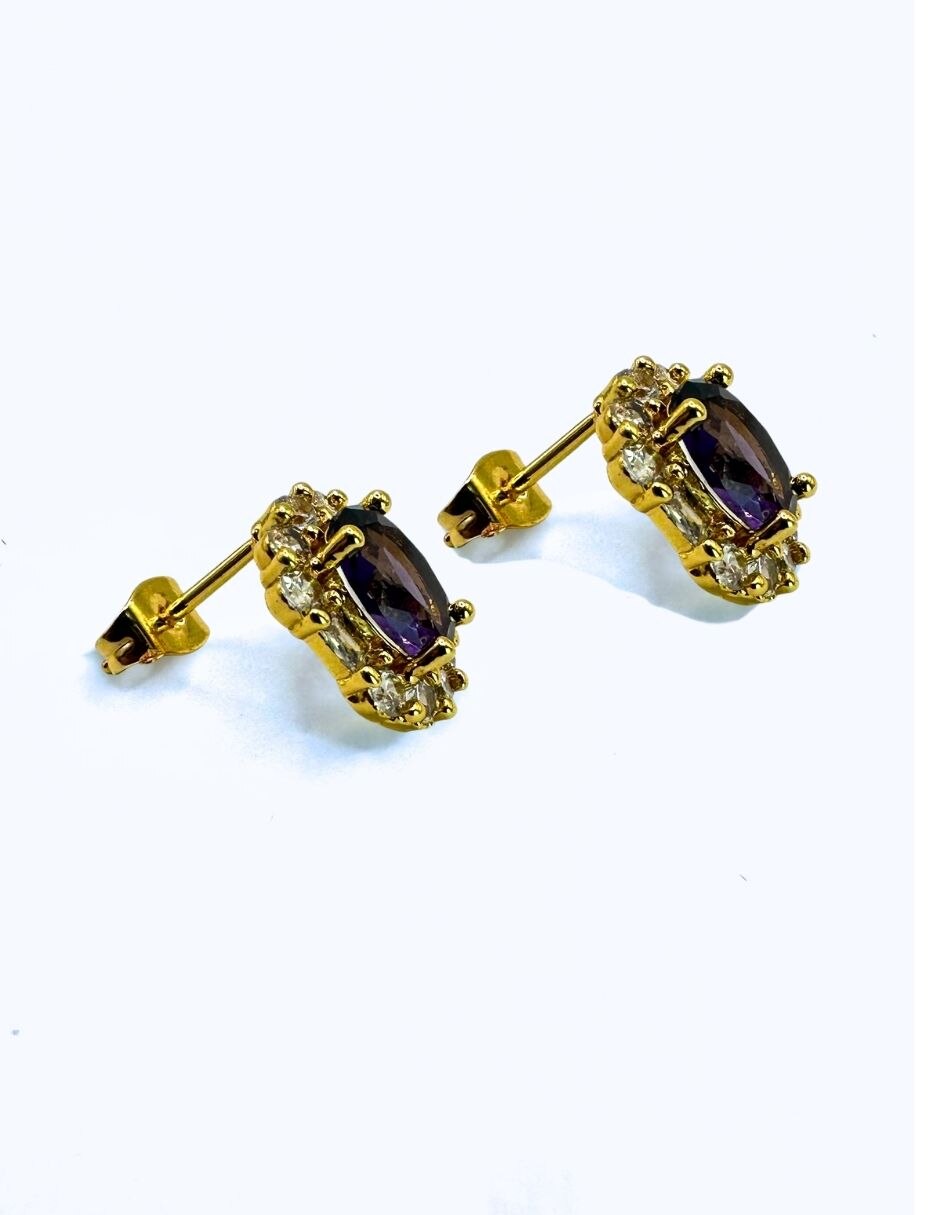 Aretes ovalados con acabado baño de oro 14 K 2